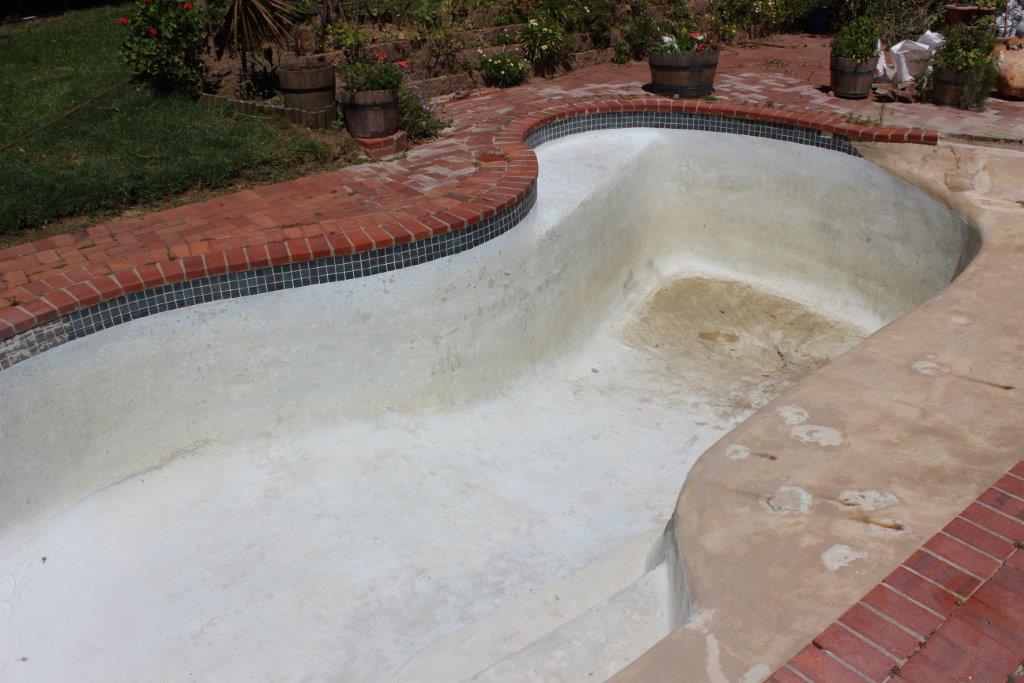 Hout Bay Fibre Glass Lining Hout Bay Pool Renovation of fibreglass pool cracks holes repaired entire pool surface sanded down.